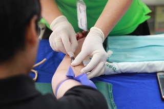 Person receiving vaccine shot