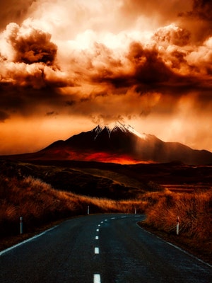 Road to storm clouds