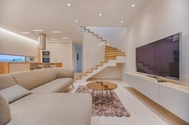 Multi-story living room with dining room