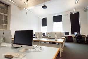 Room full of books and computers